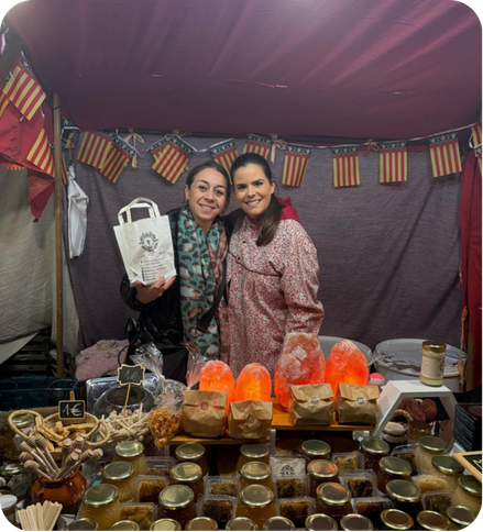 Puesto de miel artesanal Mels La Reineta con productos naturales de la colmena.